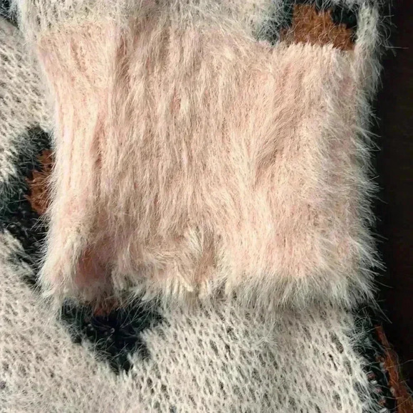 Umgee | Soft and fuzzy pink animal print pullover with puff sleeves - Picture 8 of 13
